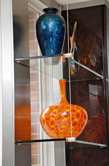 glass shelving in kitchen