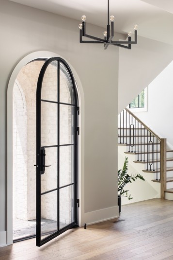 arched doorway tudor revival home design