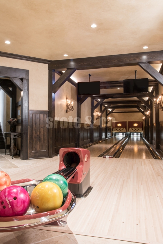 Home bowling alley design in basement