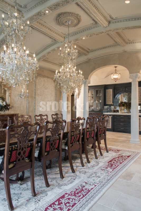 Dining room design with arched coffered ceilings