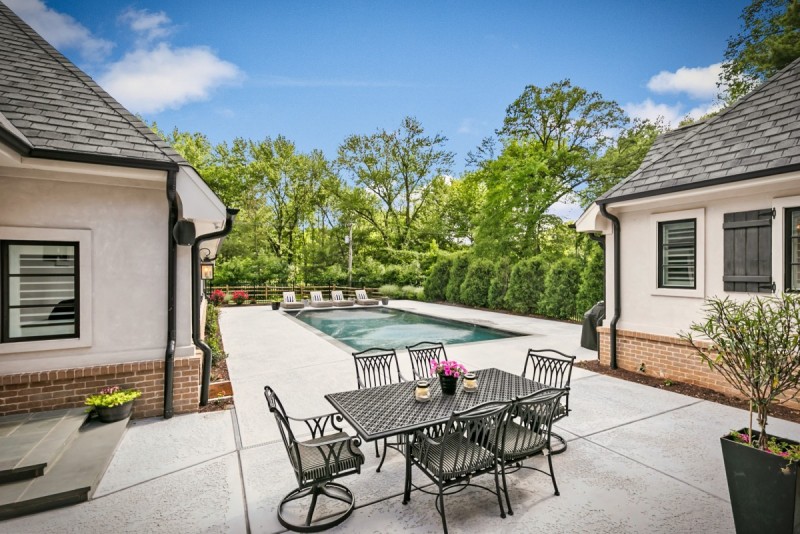 Covered lanai with view of pool deck