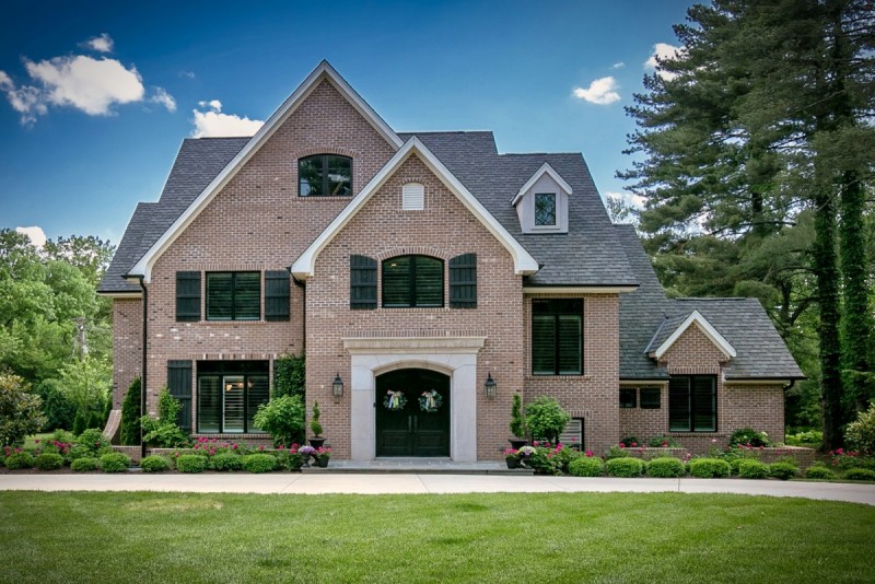 Brick exterior with cut stone entry surround