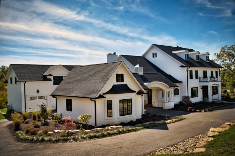 Custom home with carriage style garage