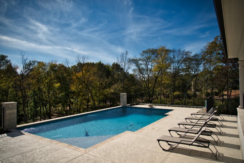 Pool deck overlooking natural landscape