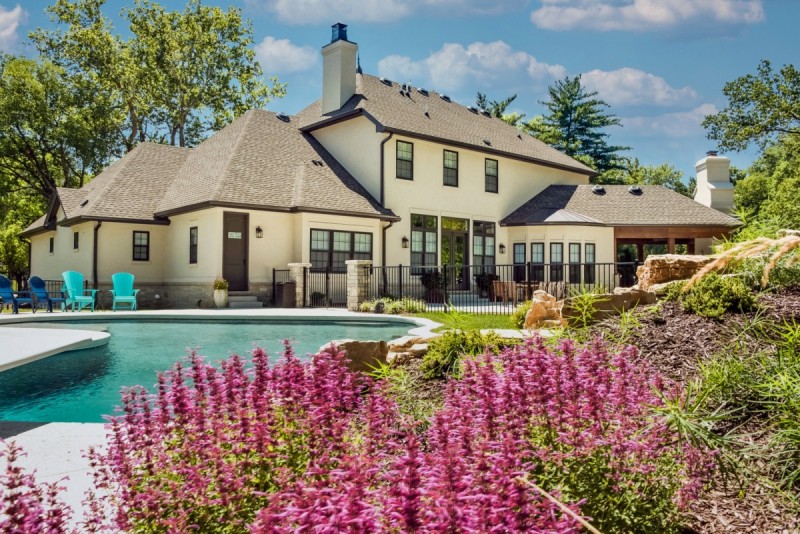 french country home design with pool
