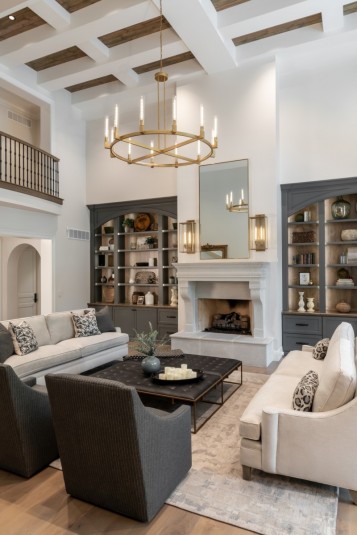 french country home great room with beam ceiling
