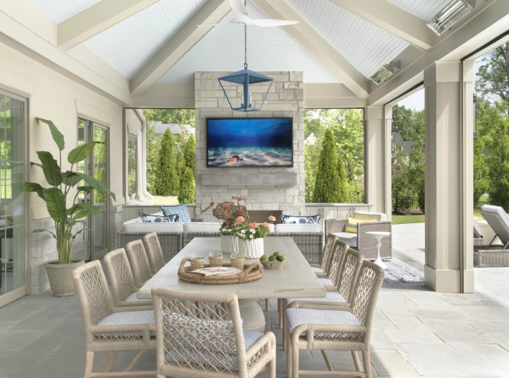 french pool house design with outdoor dining area