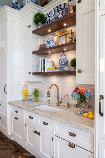 historic home kitchen design with shelving and lighting