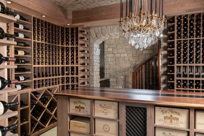 wood and stone historic home wine cellar design