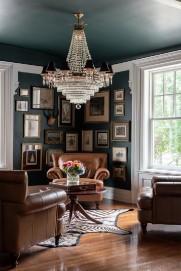 dark green historic living room interior design