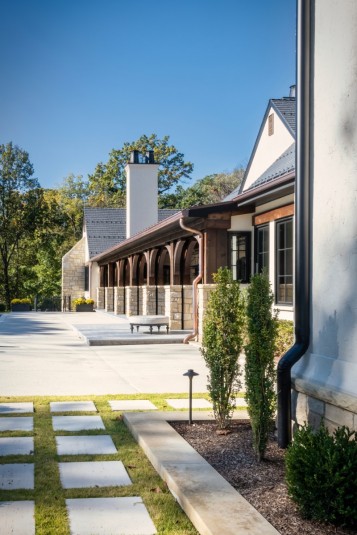 Custom pool deck and covered patio of new home