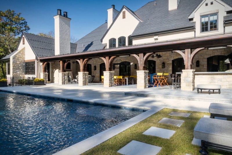 Covered patio with cedar wood corbels and metal roof