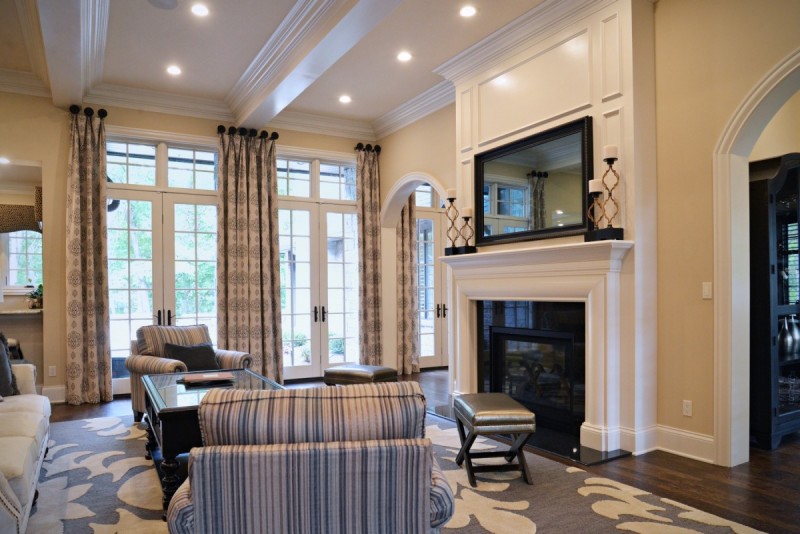 living room design with coffered ceiling