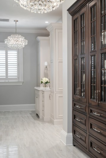 large master bath design with chandeliers