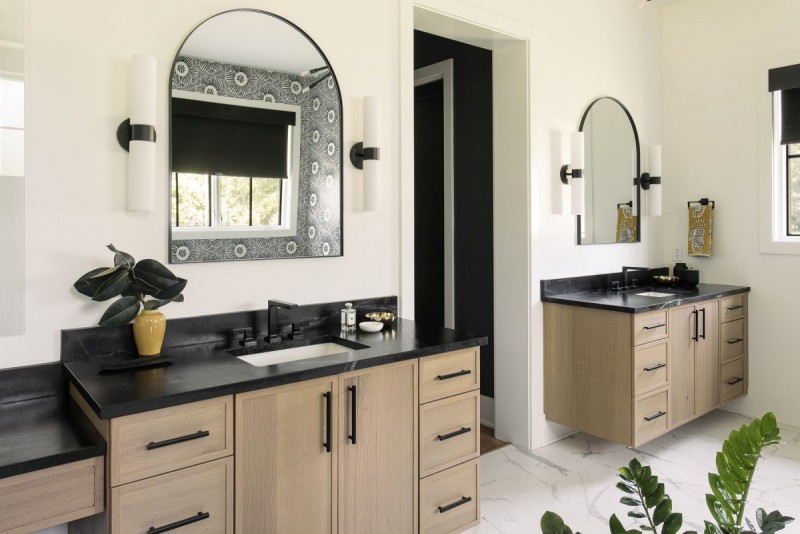 primary bath design with black white and wood