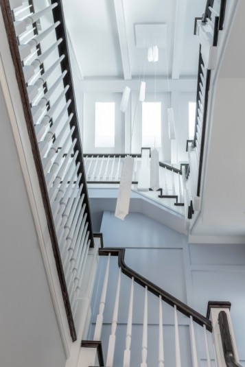 home staircase and multi pendant chandelier