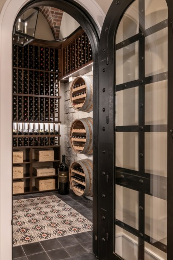 wine cellar room design with arched door