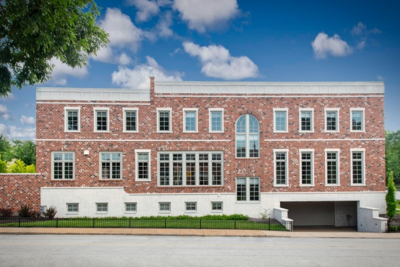 custom brick limestone home basement garage