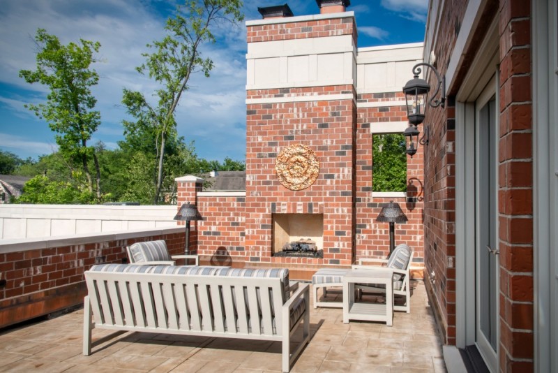 limestone brick terrace and fireplace design